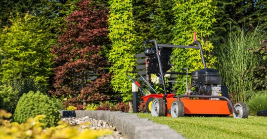 Lawn aerating using gasoline-powered machine